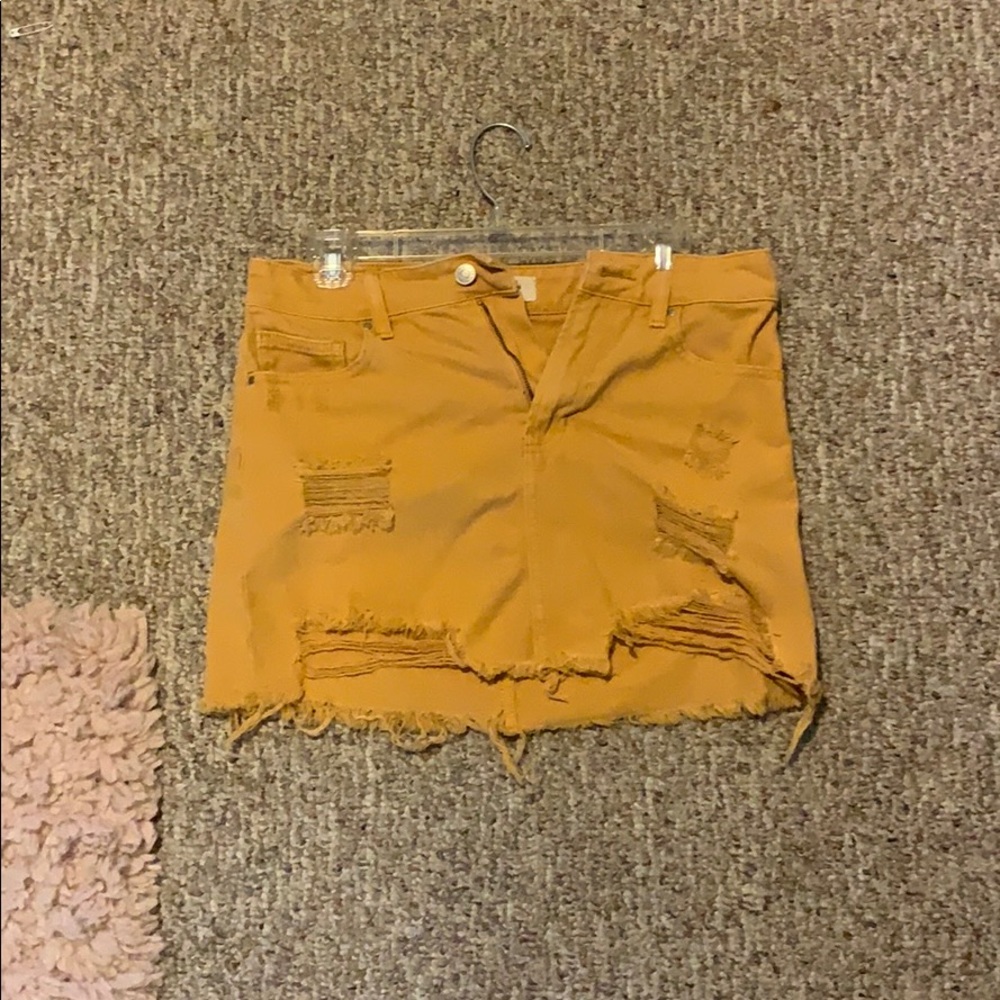 Yellow denim mini skirt
